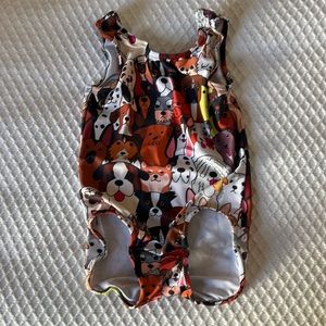 Cute dog gymnastics leotard, size 6.  Only a tiny amount of pilling/ barely worn